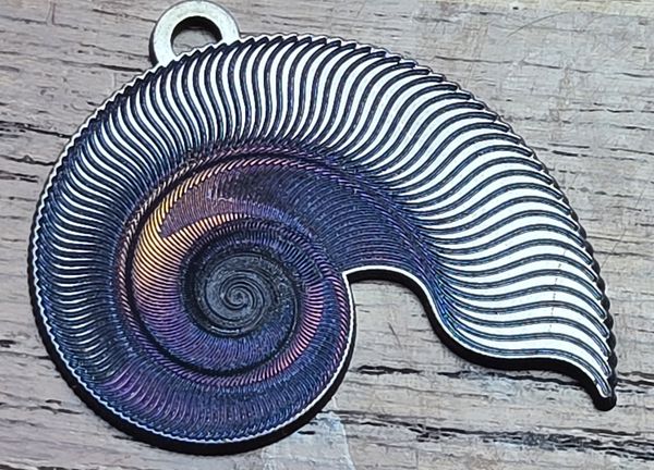 Nautilus - White Gold, Violet, & Red