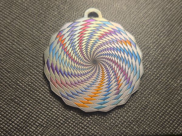 PInwheel Dream titanium pendant
