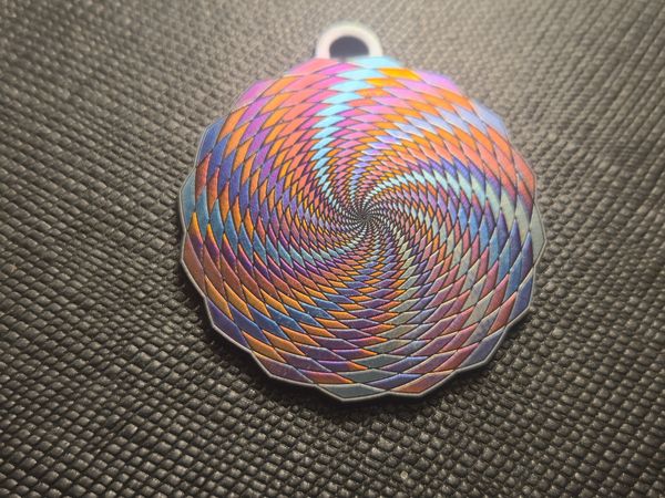Pinwheel HyperDream titanium pendant